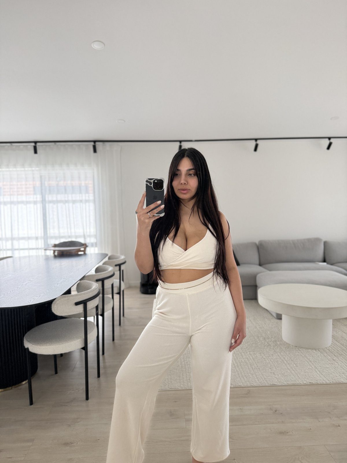 Mum wearing the bodie leakproof nursing crop bra